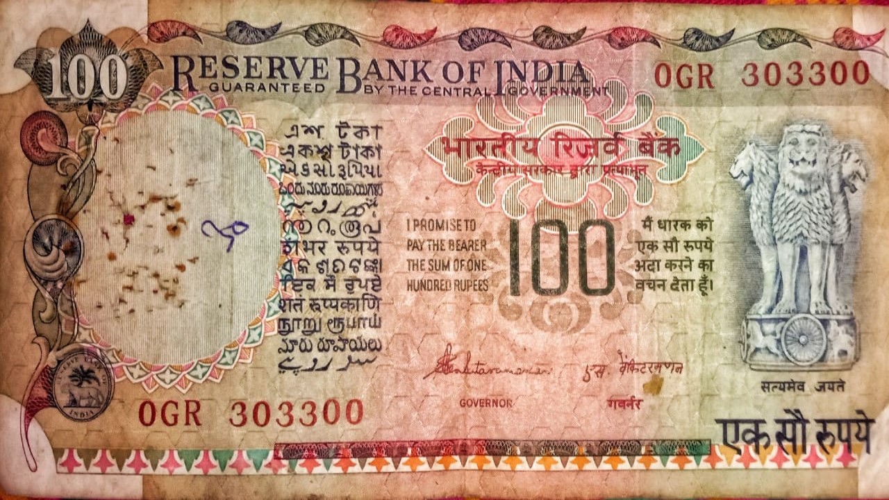 Old hundred rupees note