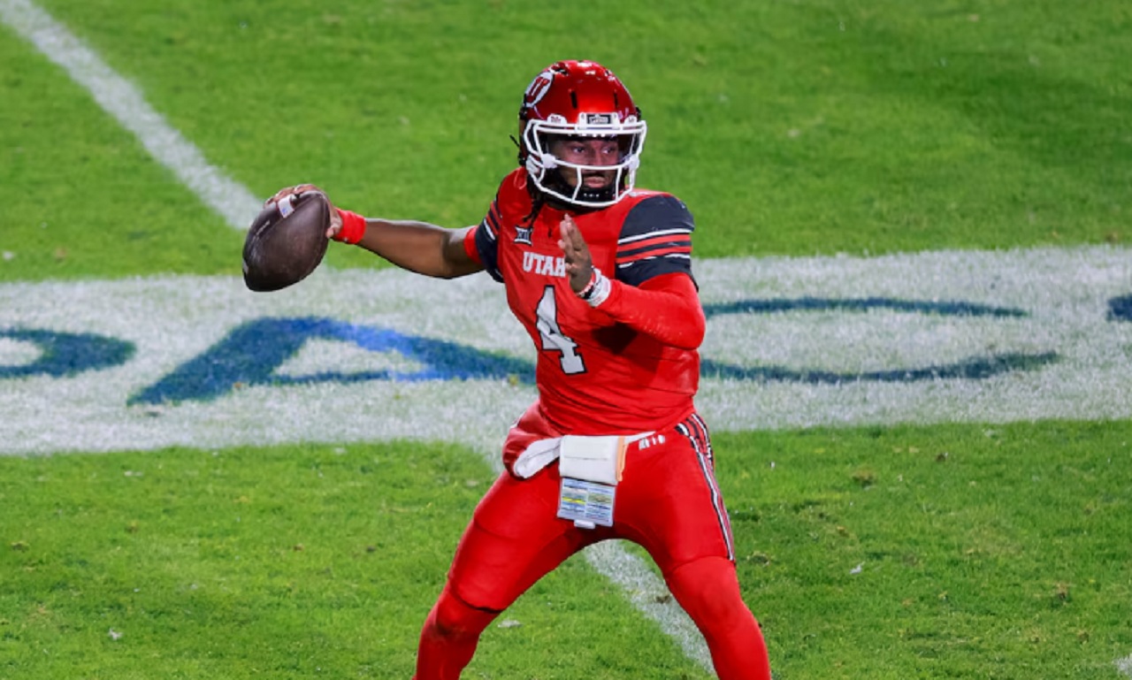 Utah QB Devon Dampier prepares to throw during pregame warmups at Rice-Eccles Stadium.