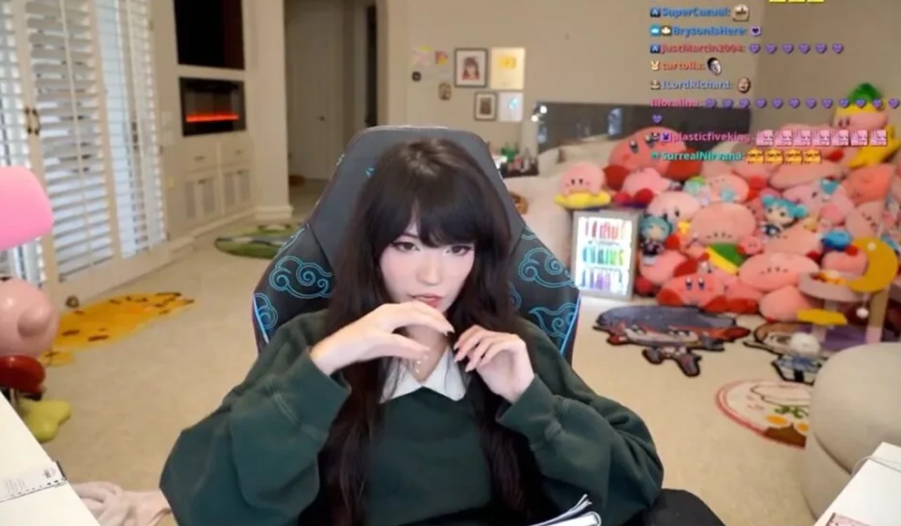 Emiru on camera during Twitch stream announcing allegations.