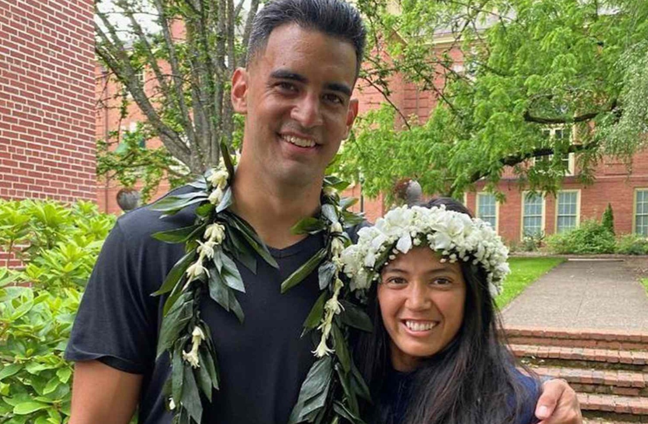 Kiyomi Cook and Marcus Mariota at a community event in Washington.