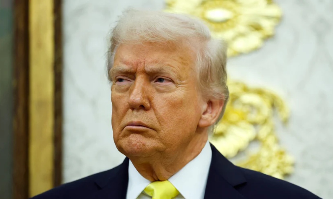 President Donald Trump addresses media aboard Air Force One after cognitive test remarks.