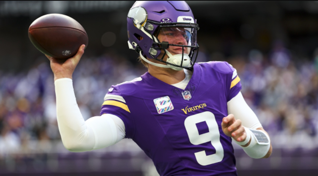 Vikings QB Carson Wentz in visible pain during Chargers game before season-ending injury.