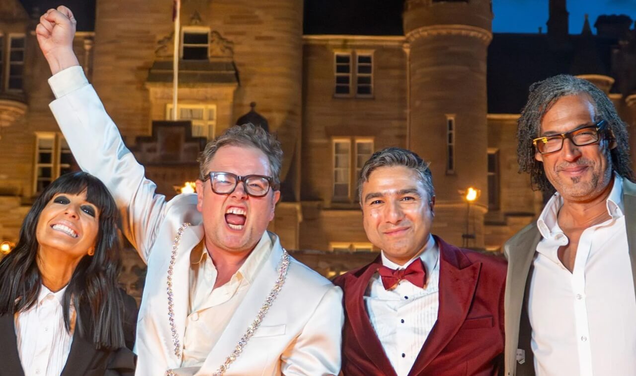 Alan Carr celebrates Celebrity Traitors win after donating his prize to Neuroblastoma UK.