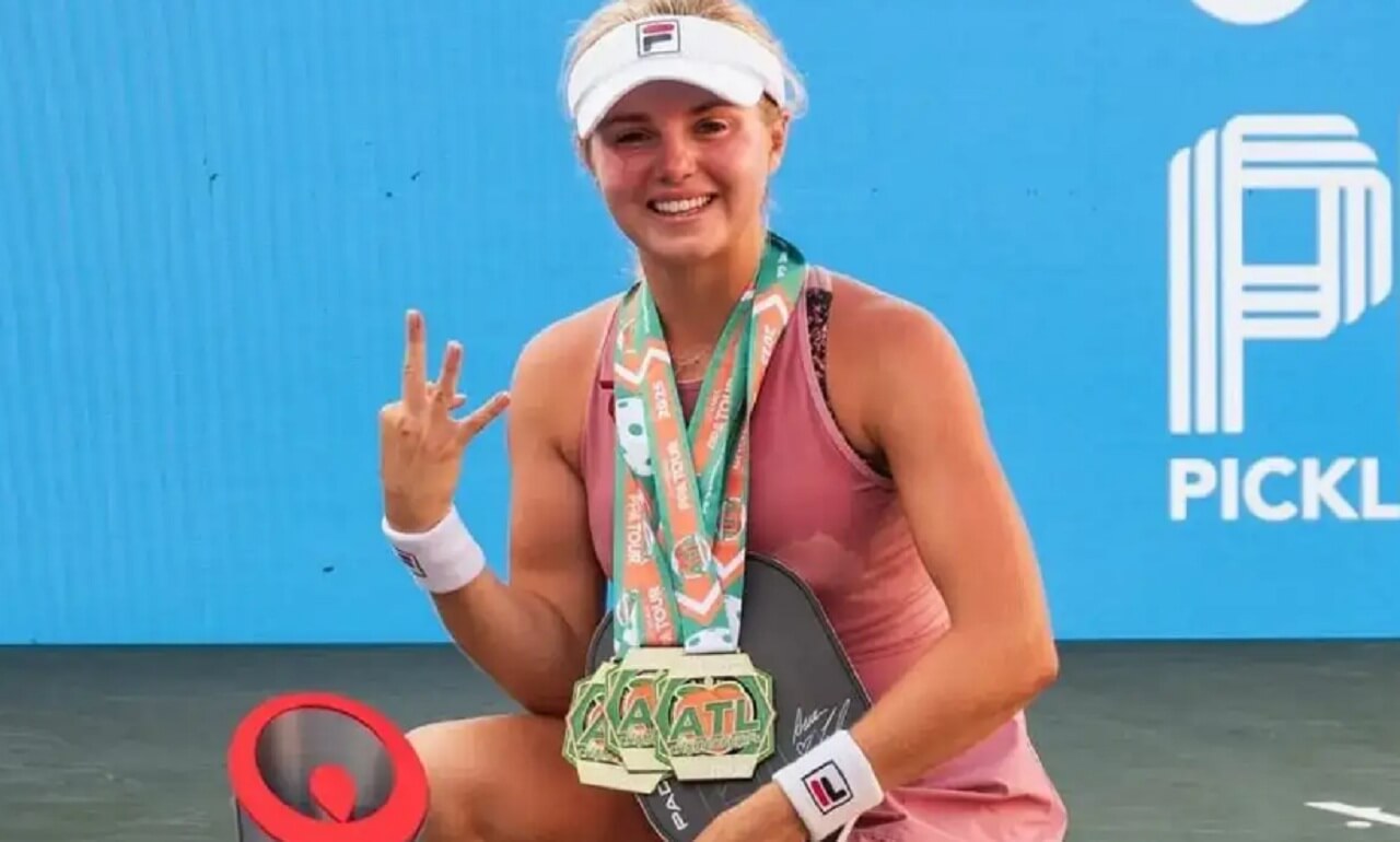 Anna Leigh Waters competing at Pickleball World Championships with puppy Archer nearby