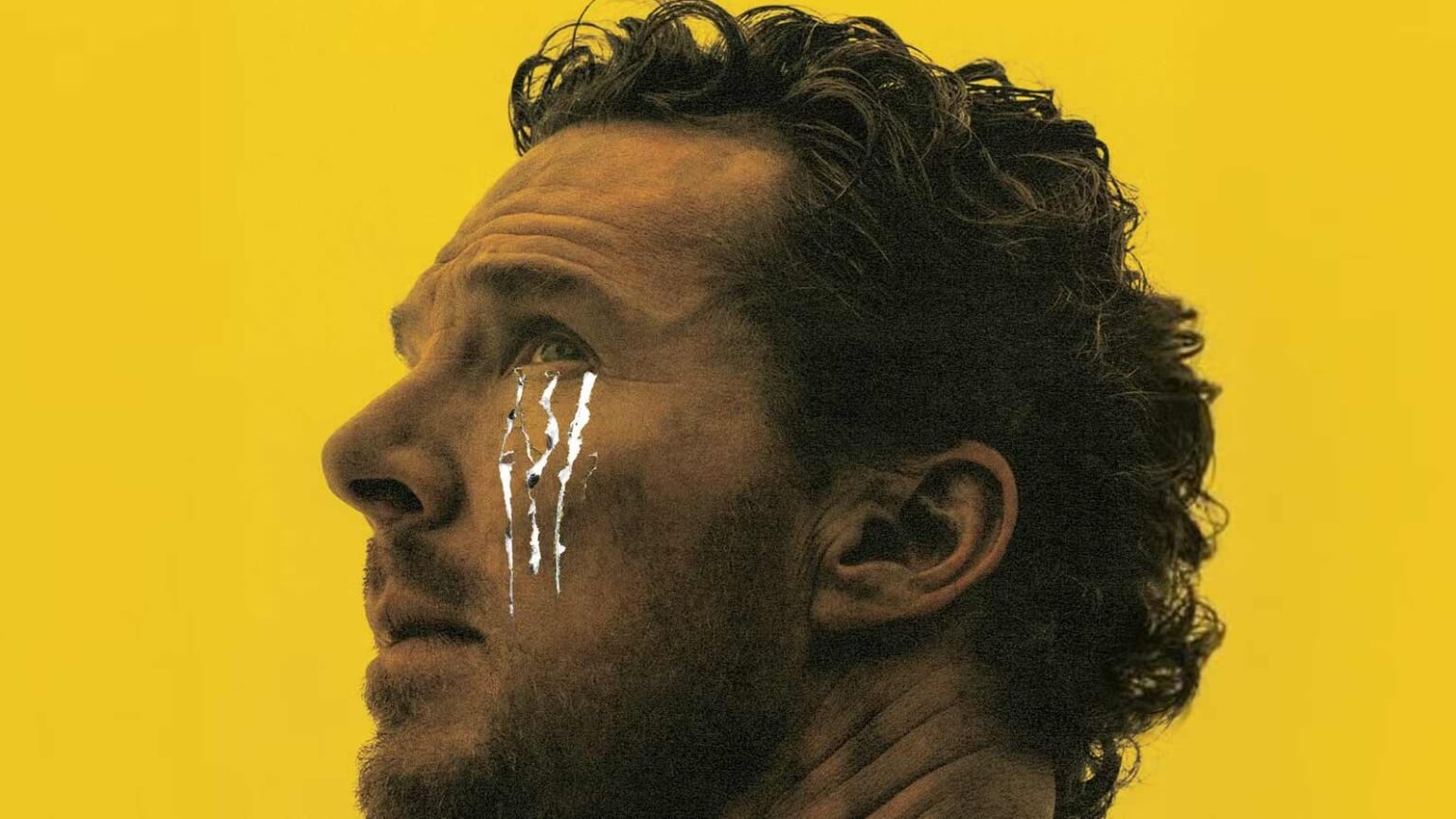 Benedict Cumberbatch in The Thing With Feathers, portraying a grieving father in a surreal, emotional scene.