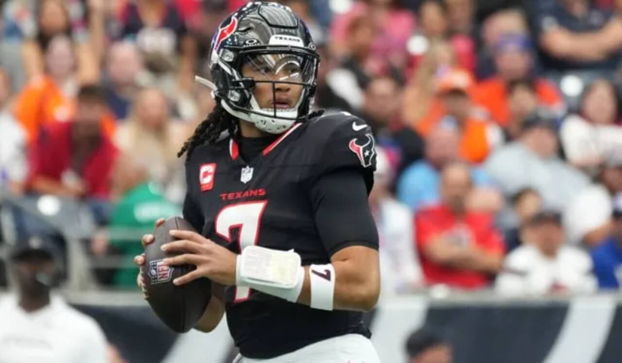 C.J. Stroud on the field in Texans uniform, as Week 12 injury update shocks fans.