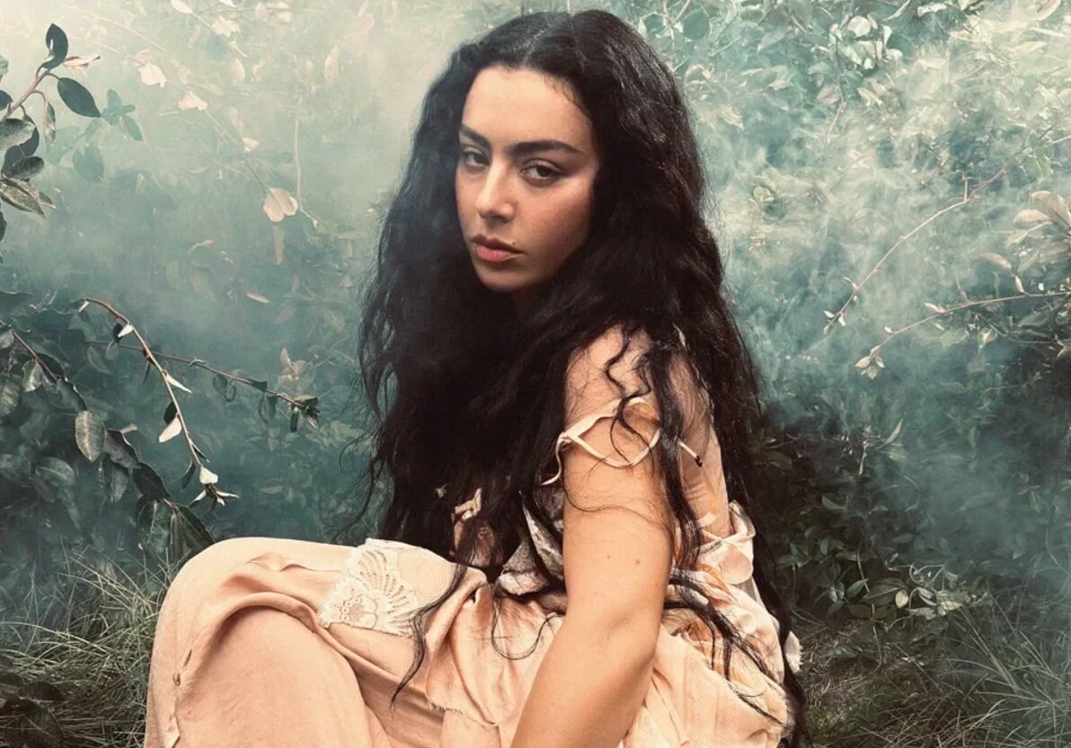 Charli XCX announces Wuthering Heights album in gothic-inspired promotional image.