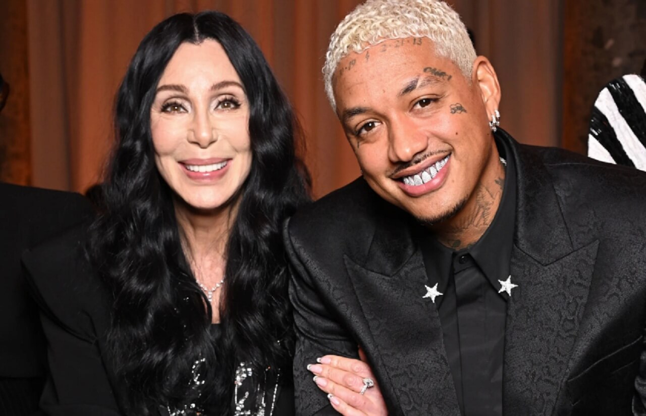 Cher and Alexander Edwards pose together at New York fashion event.