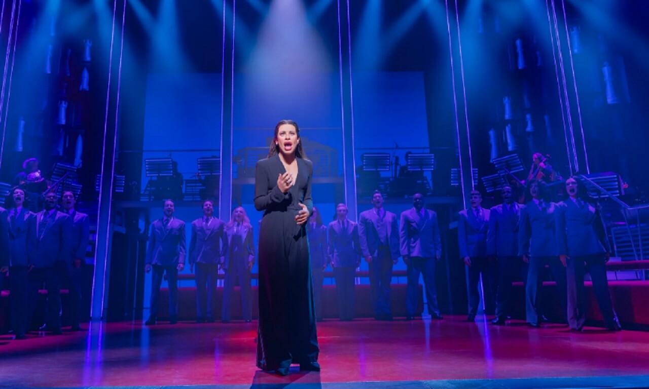 Lea Michele and Aaron Tveit performing on stage in Broadway’s bold revival of Chess at the Imperial Theatre.