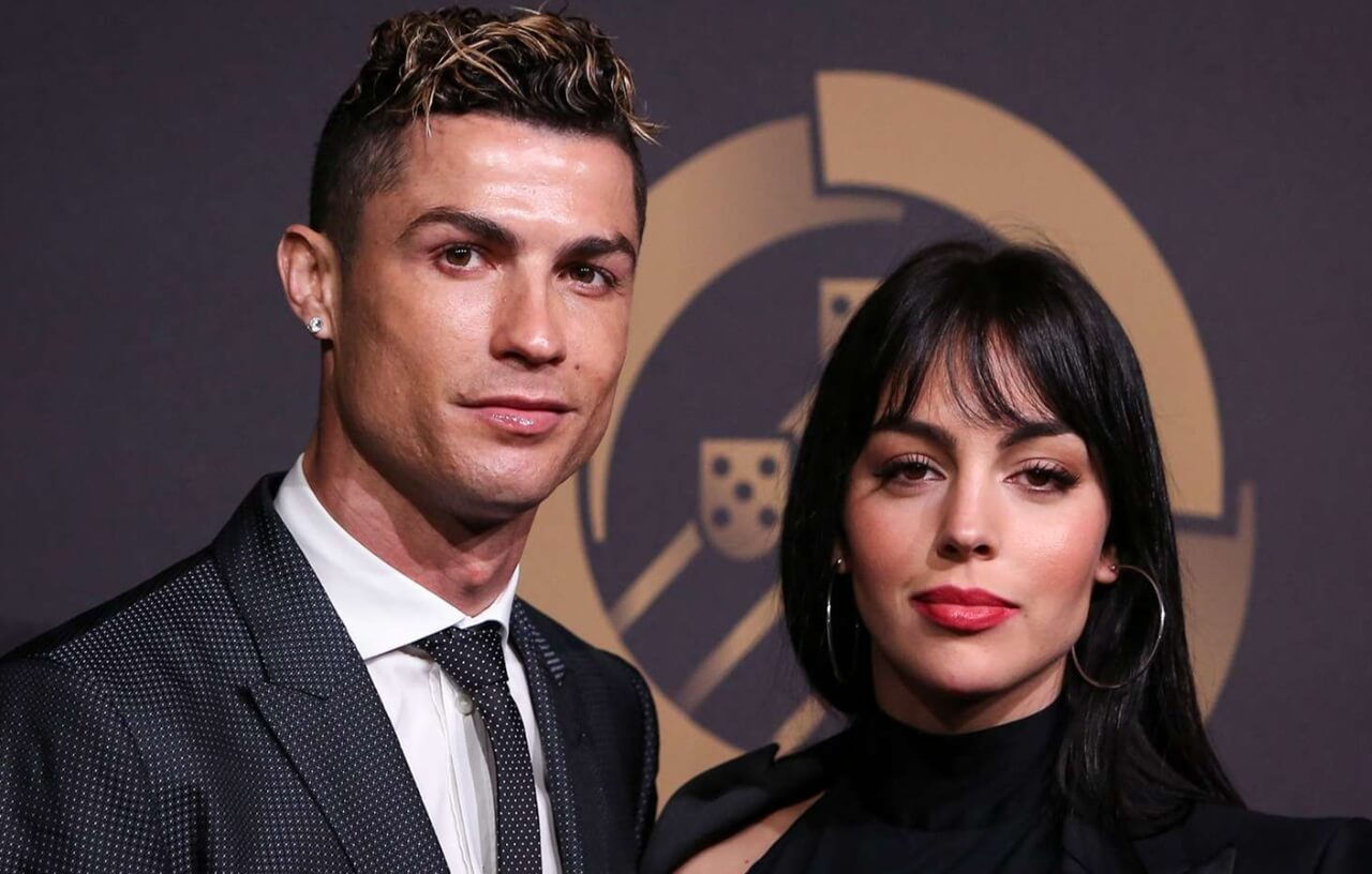 Cristiano Ronaldo, Georgina Rodríguez, and daughter Bella smiling together