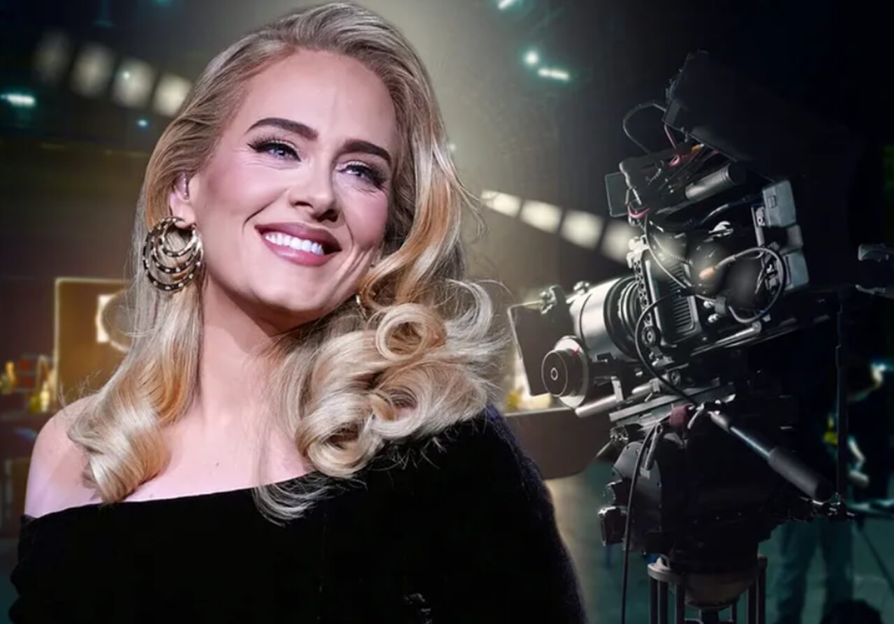 “Adele singing live on stage in Munich, Germany, August 2024.”