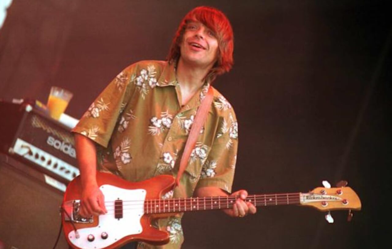 Stone Roses bassist Gari ‘Mani’ Mounfield performing live, remembered as a Manchester music legend after his shocking death.