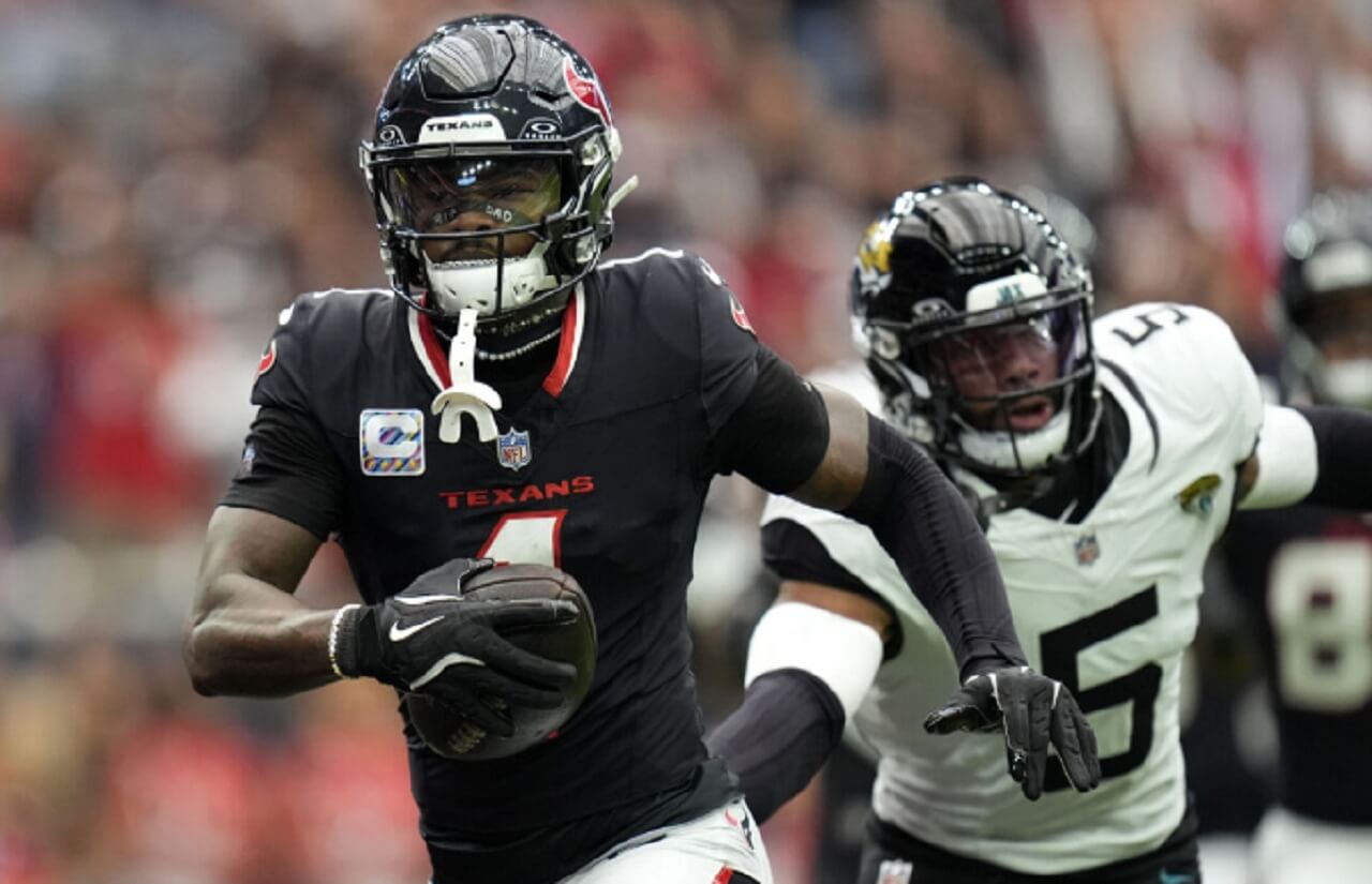 Houston Texans defense celebrates after sacking Buffalo Bills quarterback Josh Allen during their shocking upset win.