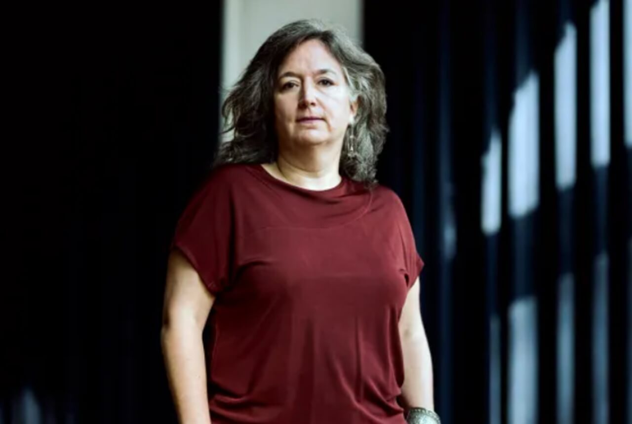 Isabel Arrate Fernandez addressing attendees at IDFA 2025.