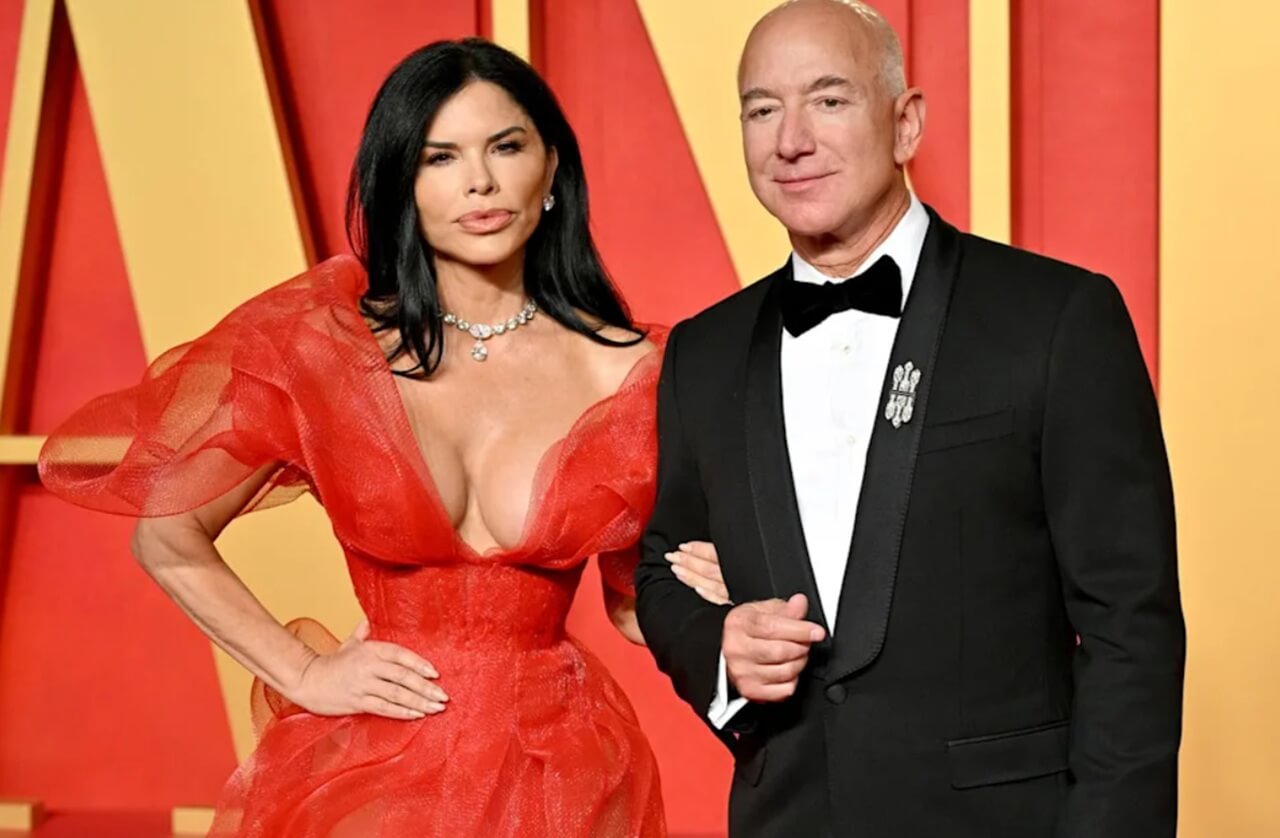 Jeff Bezos in tuxedo and Lauren Sanchez Bezos in floral gown at Met Gala