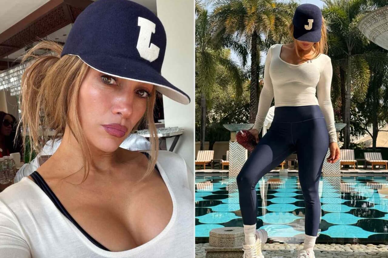 Jennifer Lopez in white workout top and navy leggings from Instagram post.