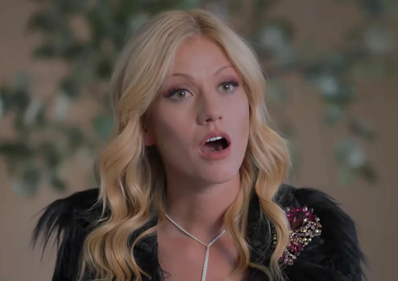 Kat McNamara riding a horse in Montana Mavericks still.