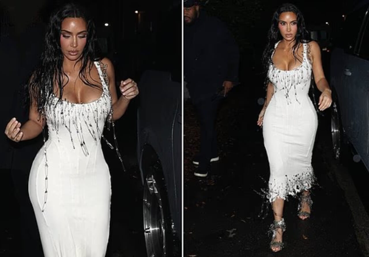 Kim Kardashian in white safety-pin dress at LA event.