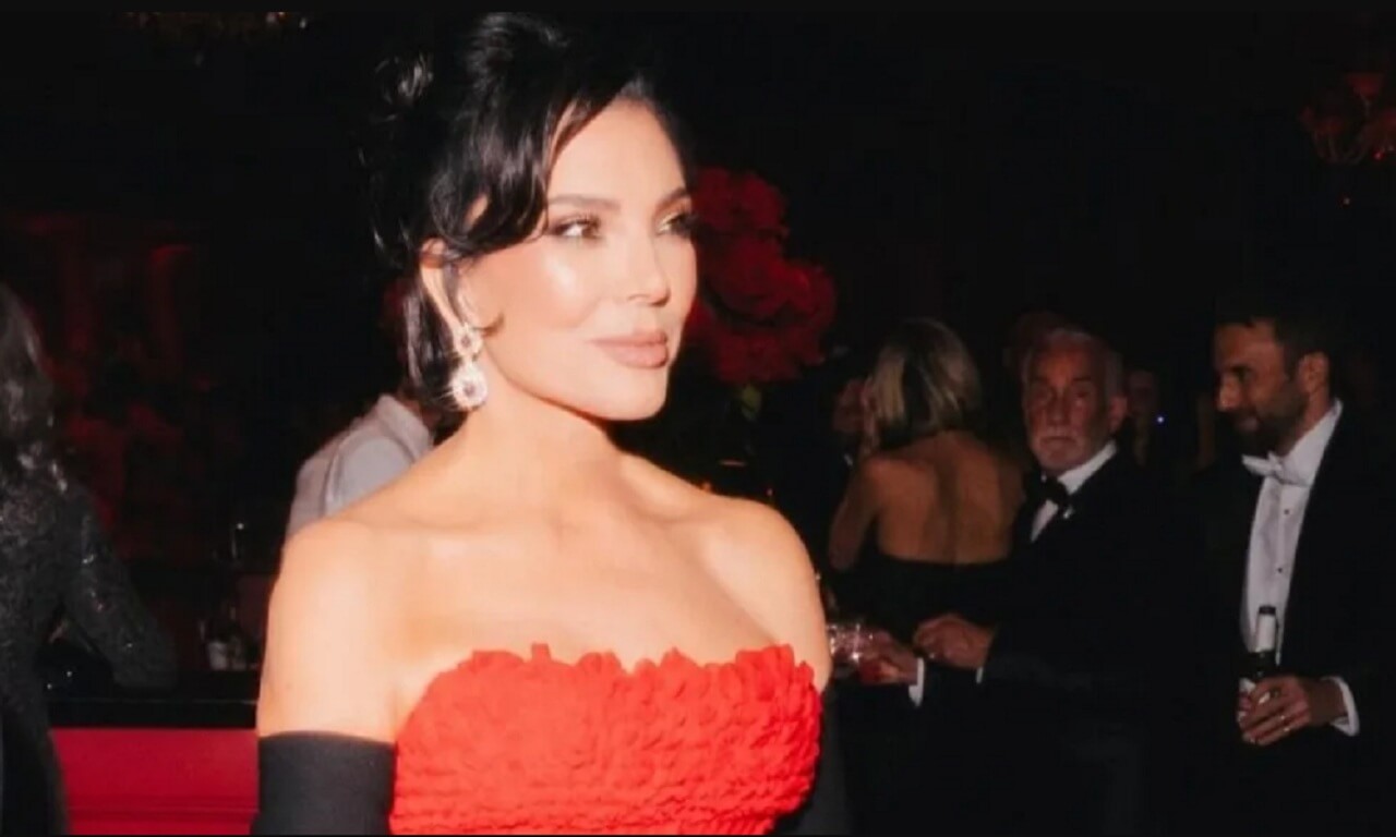 Kris Jenner wearing red Givenchy dress at her 70th birthday celebration.