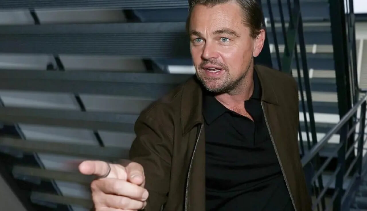Leonardo DiCaprio names The Dark Knight his favorite Nolan film in Collider interview.