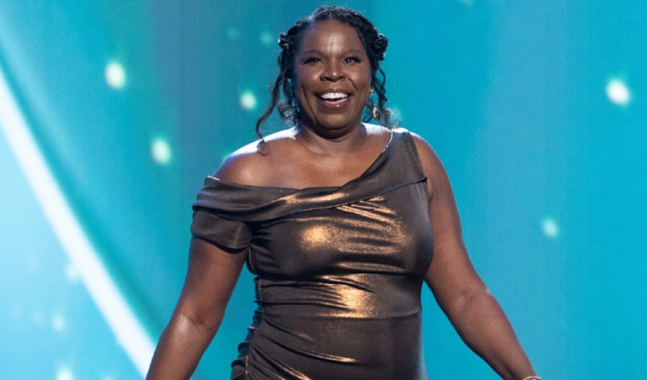 Leslie Jones on SNL stage during live sketch performance.