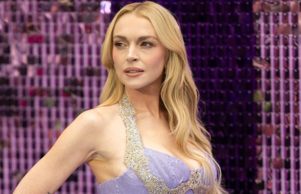 Lindsay Lohan in cream textured dress with polished glam.