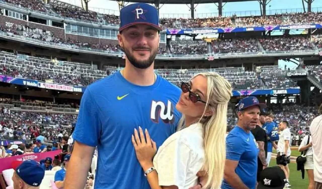 Livvy Dunne hugging Paul Skenes in celebration after his unanimous 2025 NL Cy Young Award win.