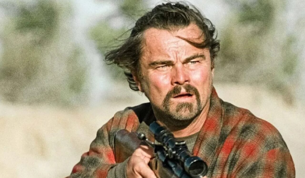 Paul Thomas Anderson with Leonardo DiCaprio at the premiere of One Battle After Another, celebrating box office success.