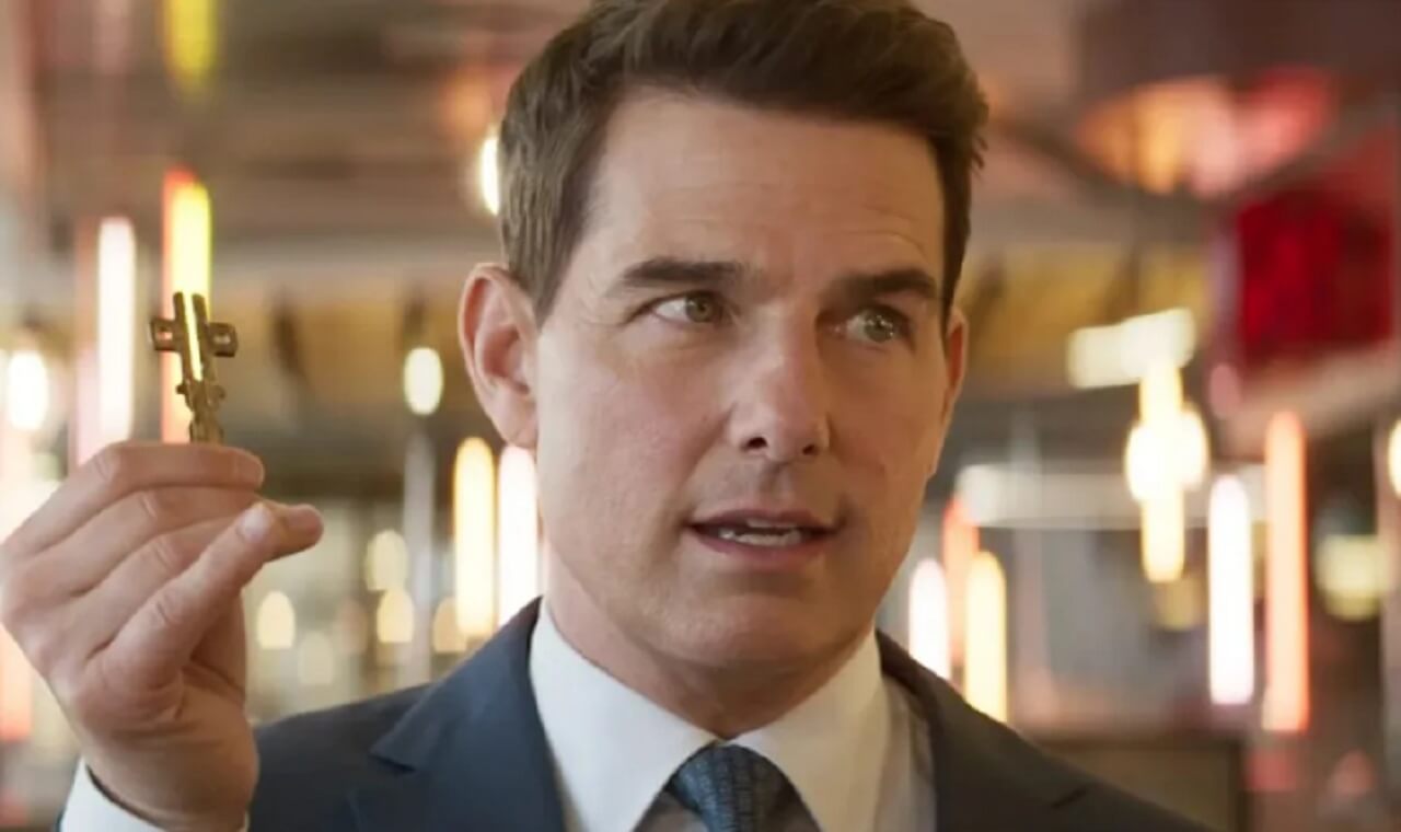 Tom Cruise holding his honorary Oscar at the Governor Awards, delivering an emotional speech.