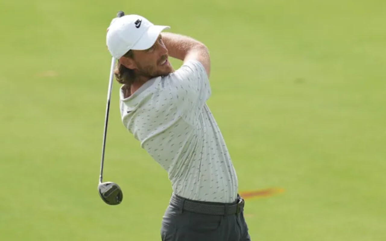 Tommy Fleetwood in action at Abu Dhabi HSBC Championship 2025