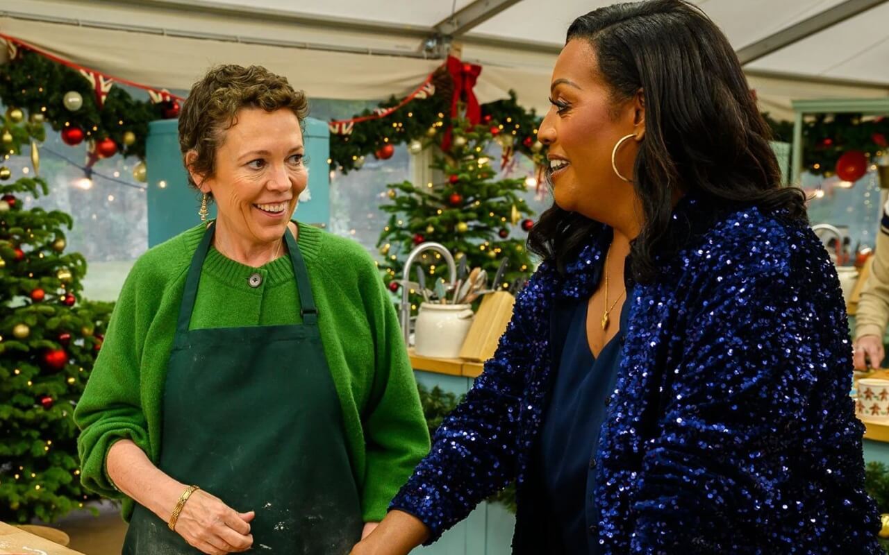Living room with Christmas tree and holiday TV schedule on screen