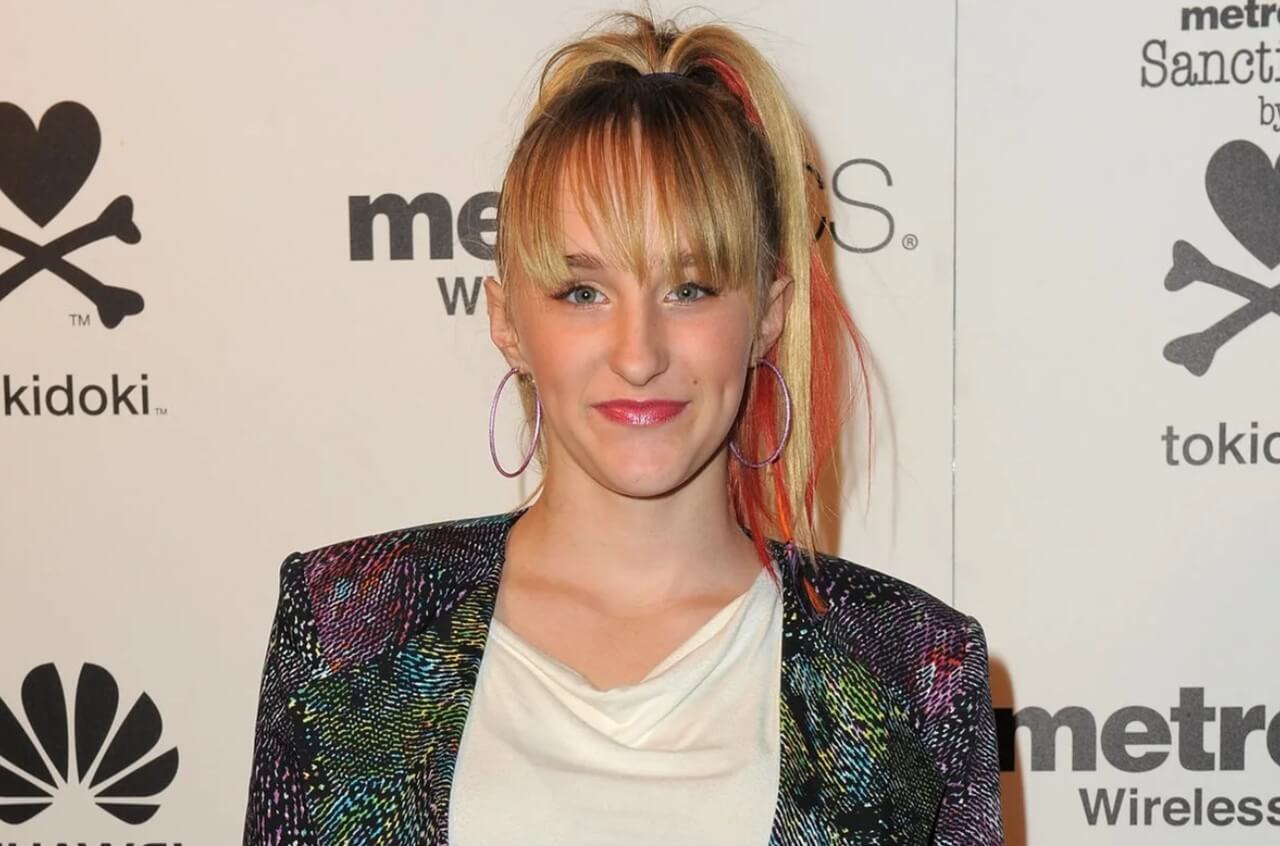 Singer Camryn Magness onstage during a live performance.