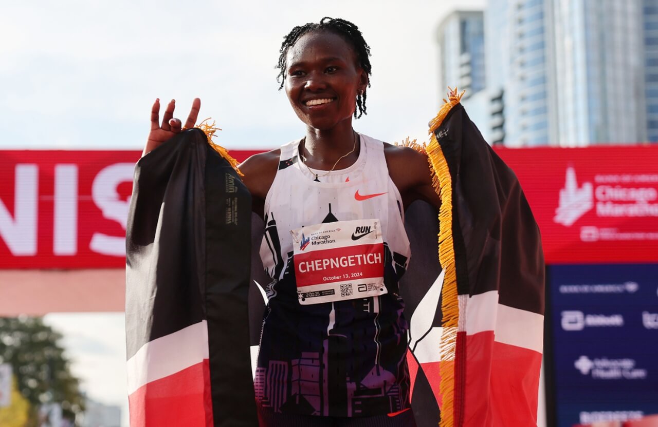 Chicago Marathon runners finishing race as event sets $47.1M fundraising record.