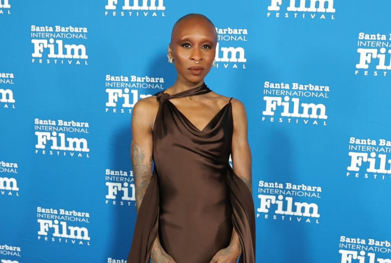Cynthia Erivo carries her signature mug at a public event, highlighting her vocal care routine.