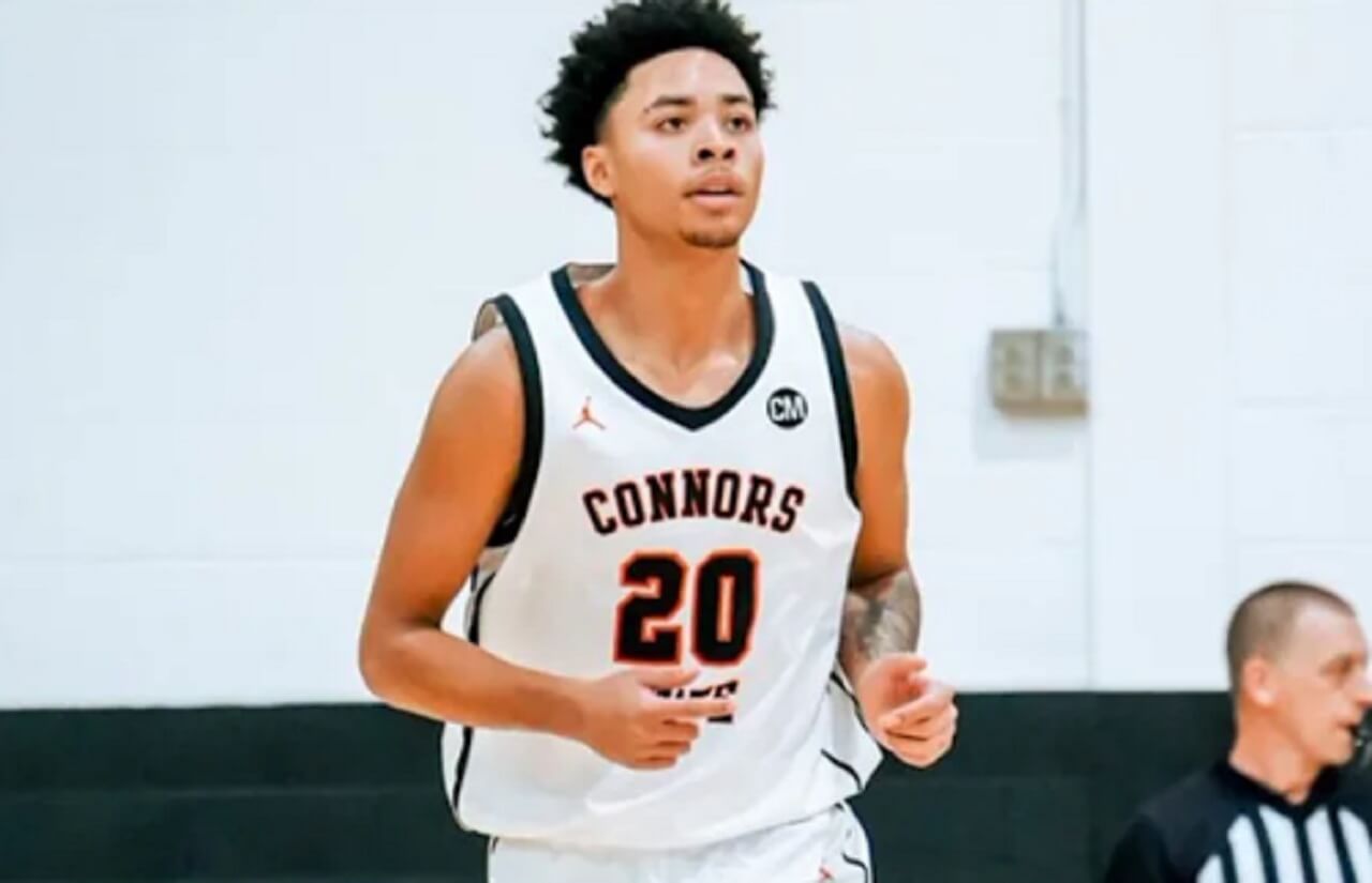 Ethan Dietz in his Connors State College basketball uniform during gameplay.