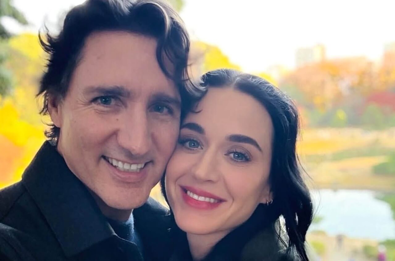 Katy Perry and Justin Trudeau smiling together in a selfie during Japan trip.