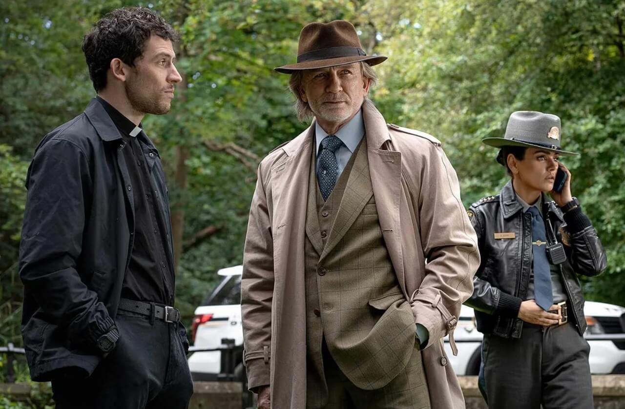 Daniel Craig as Benoit Blanc questioning suspects in Wake Up Dead Man.