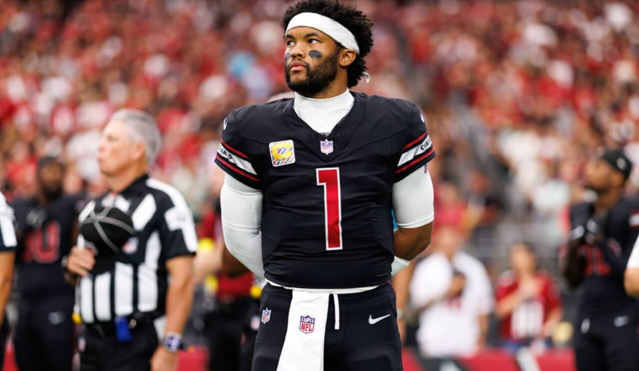 Kyler Murray on the sideline in Cardinals uniform after being ruled out for the season.