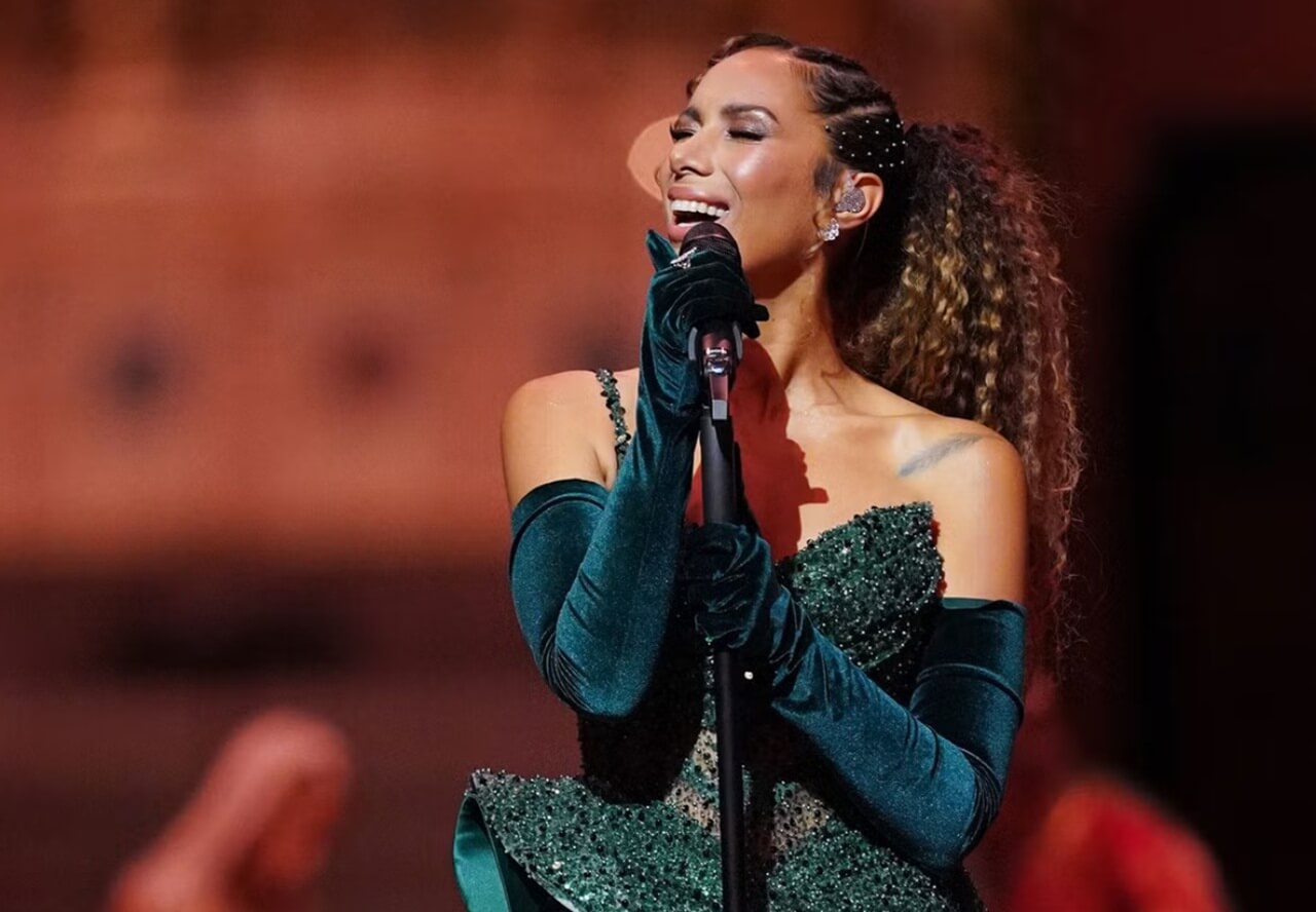 Leona Lewis singing onstage during a holiday performance while celebrating streaming success of “One More Sleep.”