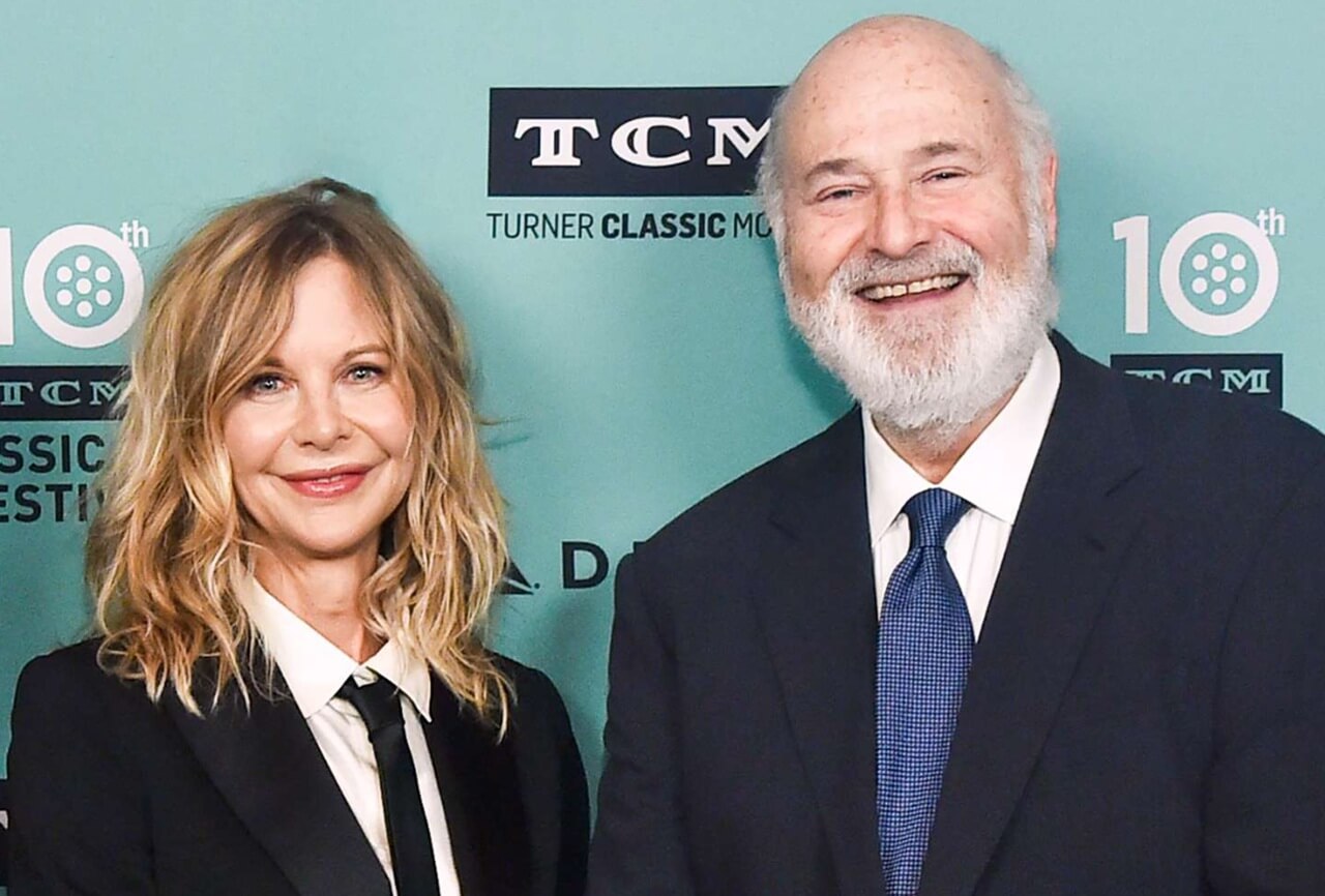 Meg Ryan dancing with director Rob Reiner on set in vintage behind-the-scenes photo