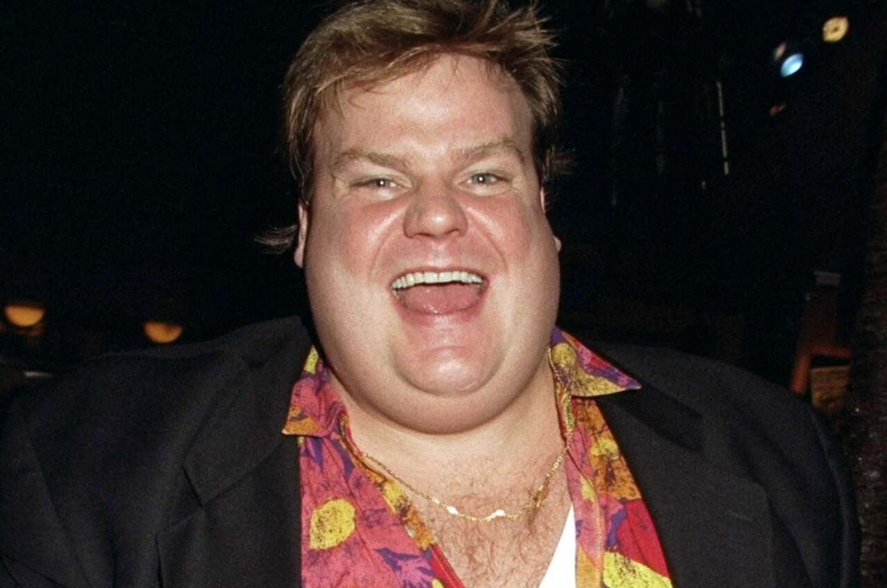 Chris Farley performs onstage in an archival photo from the 1990s.