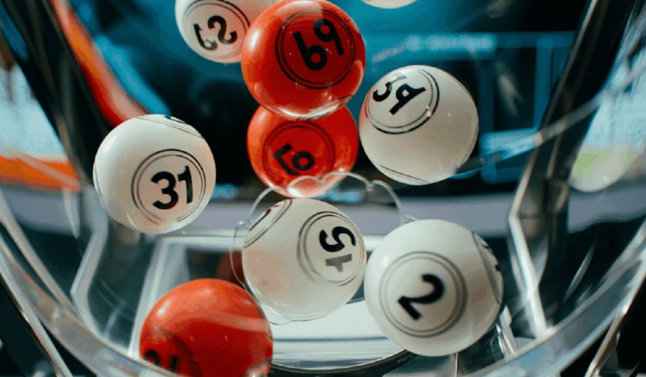 Powerball lottery balls and tickets representing the $875 million jackpot drawing.