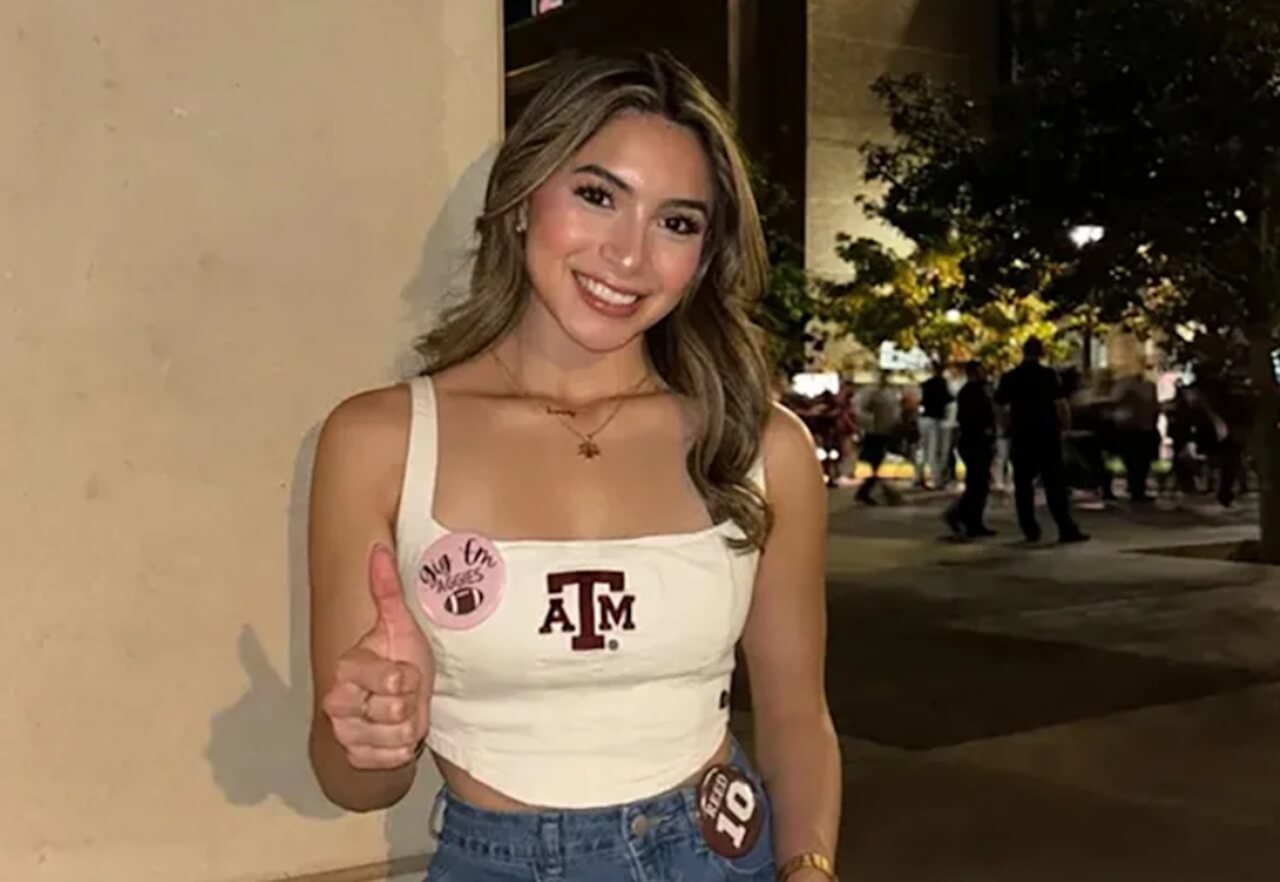 Memorial candles and flowers honoring Texas A&M student Brianna Aguilera outside an Austin apartment building.