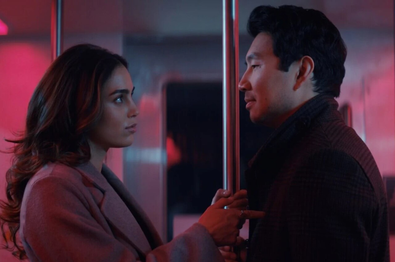 Simu Liu and Melissa Barrera in The Copenhagen Test on Peacock