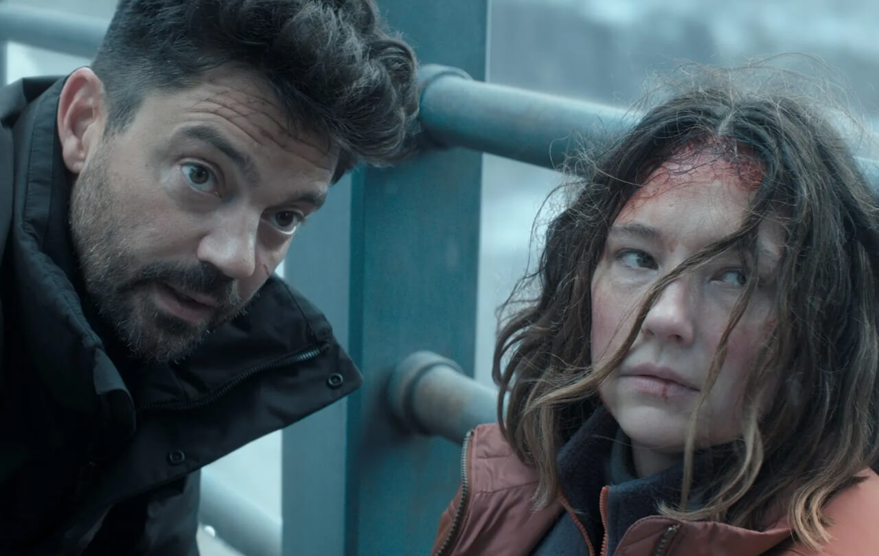 Jason Clarke and Alfre Woodard face FBI agents in a tense scene from The Last Frontier finale