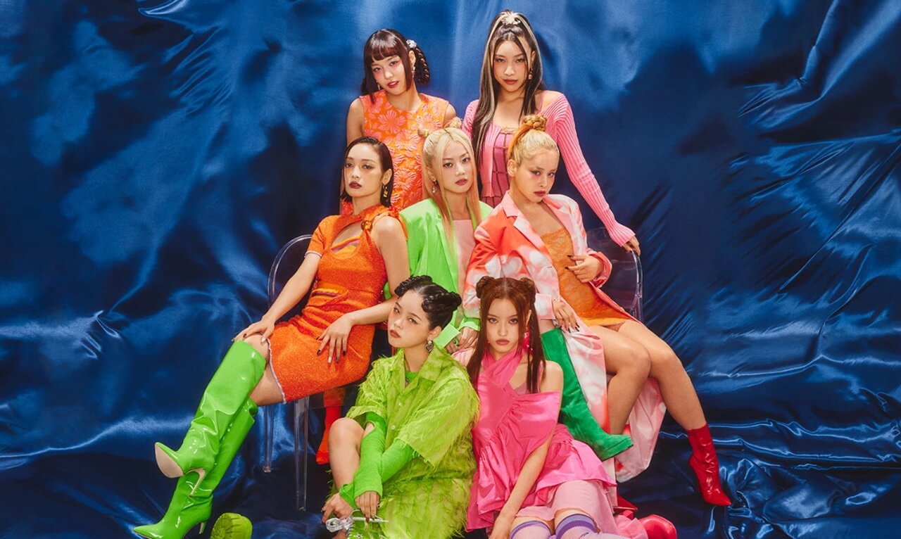 XG member Cocona performing live on stage following personal announcement.