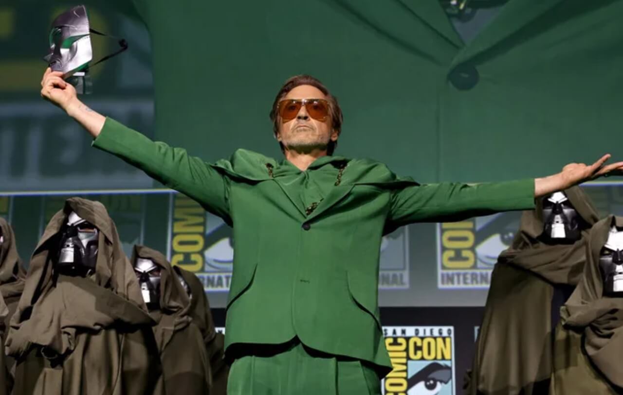 Robert Downey Jr. unveils Doctor Doom mask at Comic-Con panel.