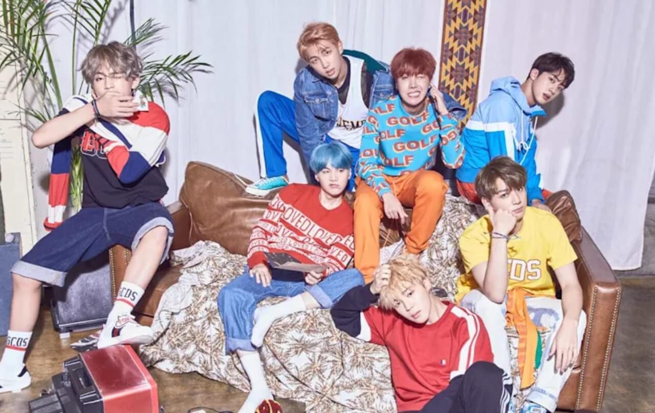 BTS reunites for full-group comeback announced for March 20, 2026.