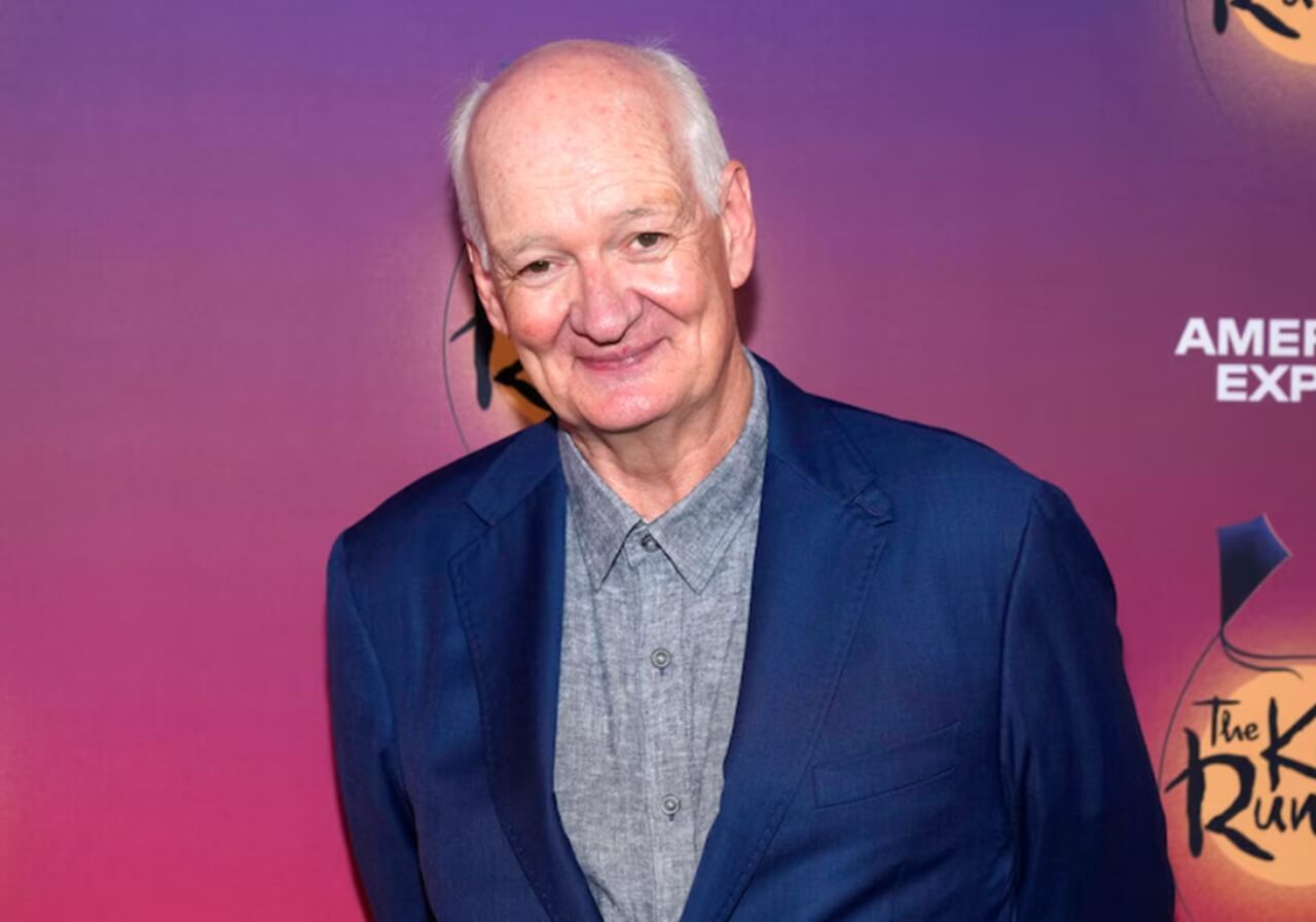Colin Mochrie attends an event before canceling comedy tour dates due to emergency eye surgery.
