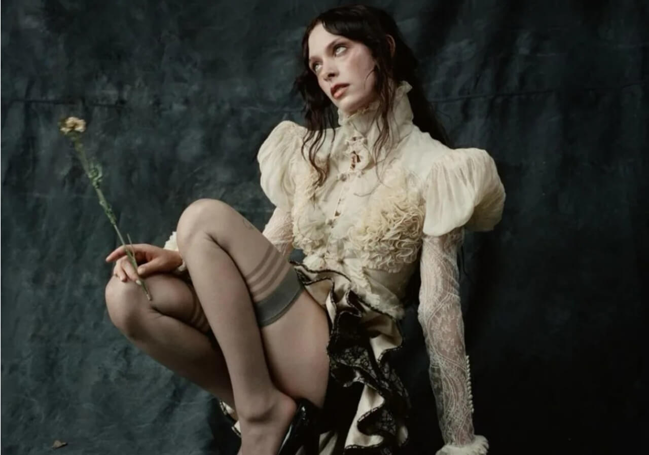 Holly Humberstone announces new album Cruel World with gothic-inspired visuals.